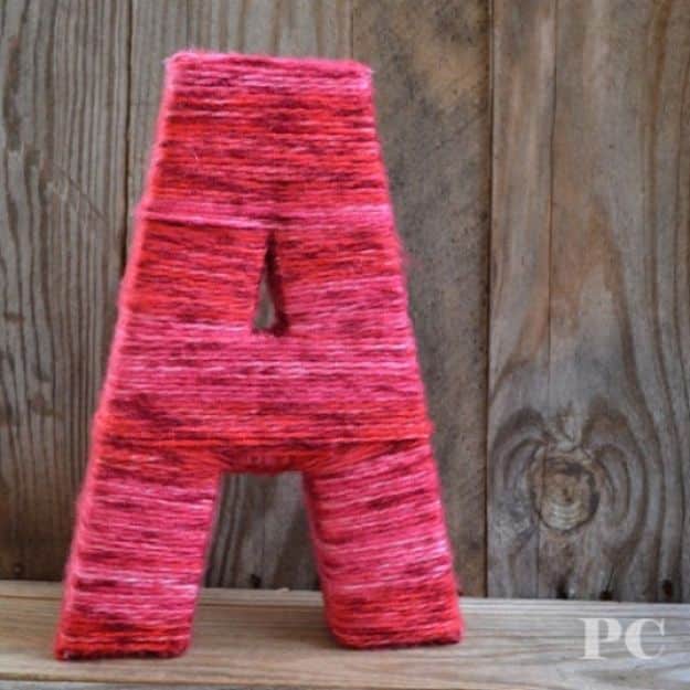 DIY Baby Shower Decorations - Yarn Wrapped Letter - Cute and Easy Ways to Decorate for A Baby Shower Ideas in Pink and Blue for Boys and Girls- Games and Party Decor - Banners, Cake, Invitations and Favors #babygifts #babyshower #diybabygifts