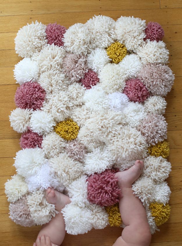 DIY Nursery Decor Ideas for Girls - DIY Easy Pom Pom Rug - Cute Pink Room Decorations for Baby Girl - Crib Bedding, Changing Table, Organization Idea, Furniture and Easy Wall Art