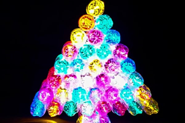 Learn to make an Easy cheap plastic water bottle Christmas Tree Luminary for no money