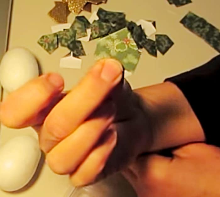 Learn to make this cheap easy DIY Pinecone Ornament out of paper and a styrofoam egg