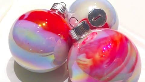 DIY Candy Cane Swirl Paint Pour Ornaments | DIY Joy Projects and Crafts Ideas
