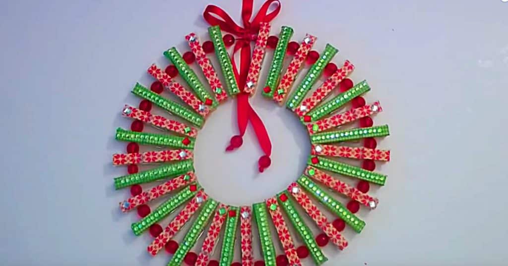 Learn to make this cheap quick easy DIY clothespin wreath from Dollar Tree