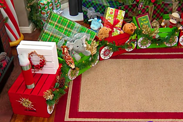 Learn to make a DIY Christmas Crate Train out of craft crates and spray paint