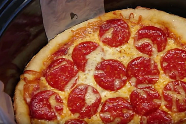 Learn to make this crockpot pizza recipe using pop biscuit dough