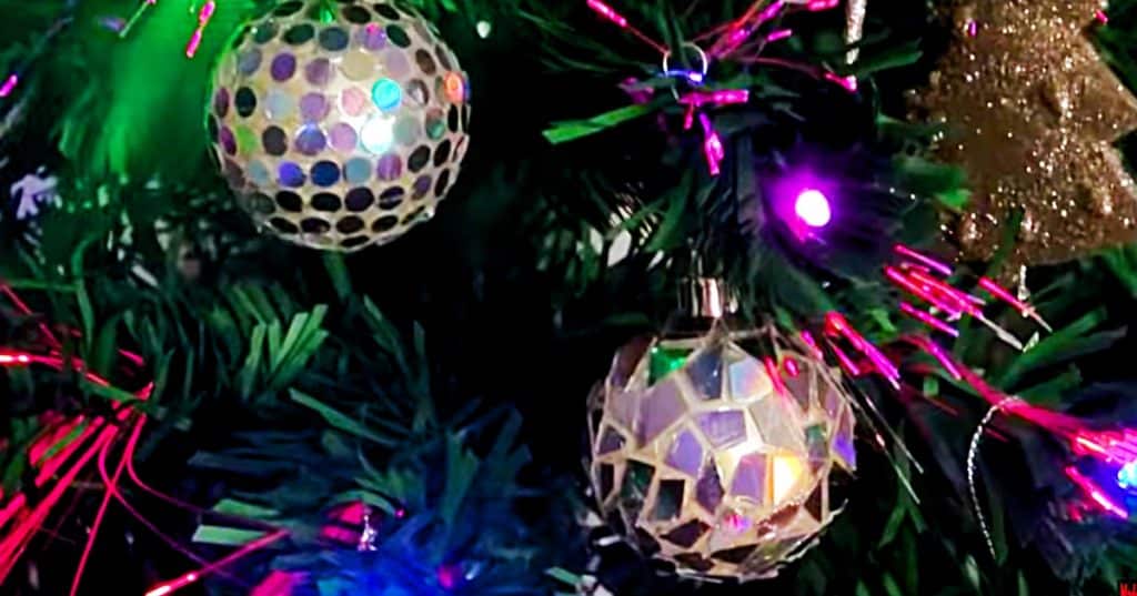 Learn to make this quick easy DIY Disco Ball Christmas Ornament using old CDs