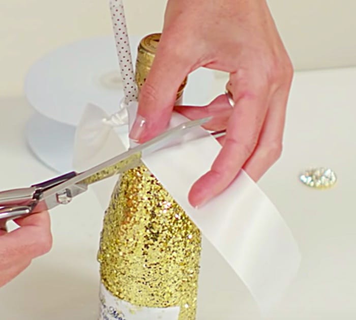 Learn to make easy cheap DIY Glitter Champagne Bottles