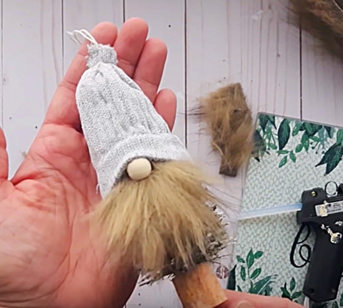 Watch this tutorial and learn how to make a DIY easy cheap Gnome Christmas Ornament