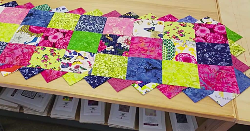 Learn to sew and quilt a prairie points table runner