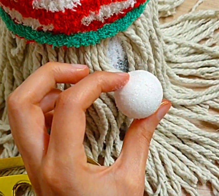 Learn to make a DIY Sock Gnome for Christmas out of rice and Dollar Tree Items