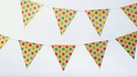 DIY Leftover Wrapping Paper Flag Garland | DIY Joy Projects and Crafts Ideas