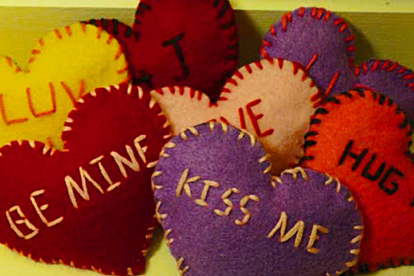 Learn to make these quick easy Valentine Felt Hearts that look like the old school Valentine's Day Candy
