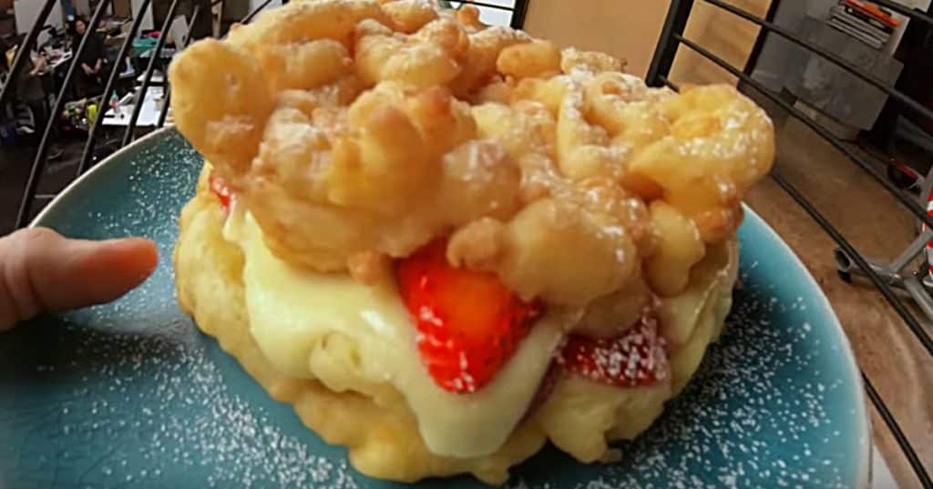 Make a Funnel Cake Grilled Cheese with strawberries
