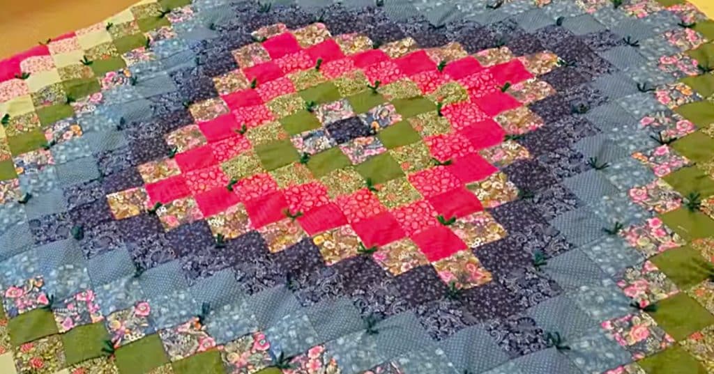 Hand tie a quilt in a an easy quick tutorial