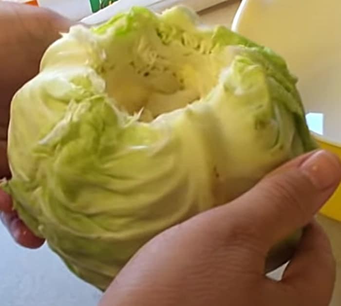 Make crockpot stuffed cabbage rolls with sausage and rice