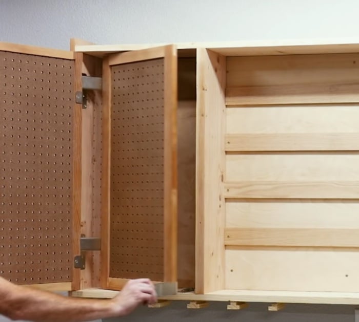 Make a DIY sliding door tool cabinet with pegboard
