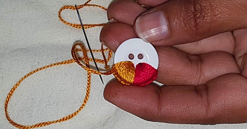 Make hand embroidered buttons.