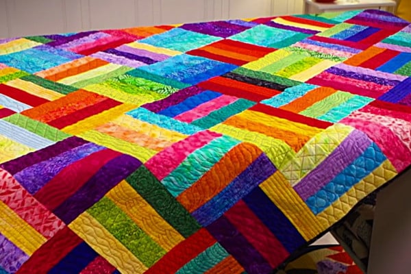 Make a jelly roll quilt easy and quick