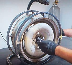 DIY Garden Hose Reel Using An Old Car Wheel