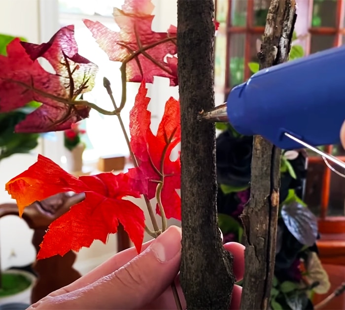 Glue Stem Leafs Onto Branch To Make Fall Tree - Cheap and Simple Crafts - Fall Crafts