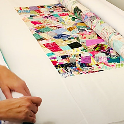 How To Baste A Quilt Using Pool Noodles - DIY Joy