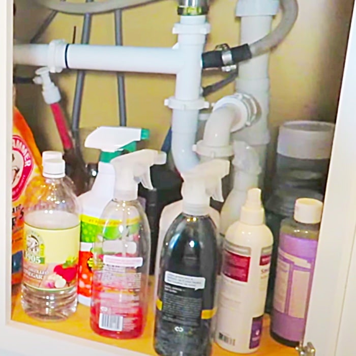 Easy Way To Organize Under The Sink Using A Tension Rod - Cleaning Hacks - Organize Under The Sink