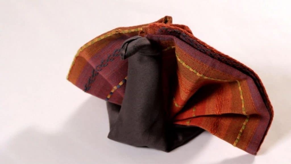 How to shape table napkin into turkey