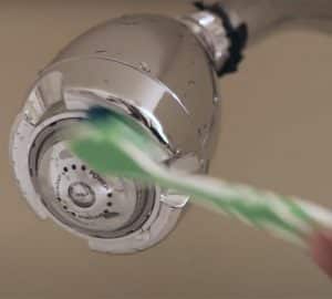 How to Clean a Grimy Shower Head with Vinegar - DIY Joy