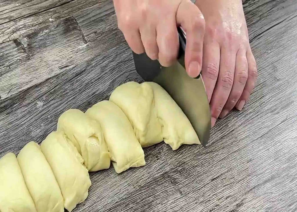 Cutting the dough into pieces, ready to be bake
