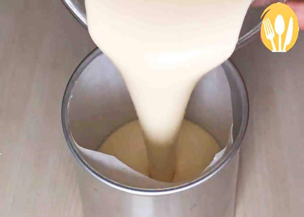 Pouring the cake mixture into the cake mold