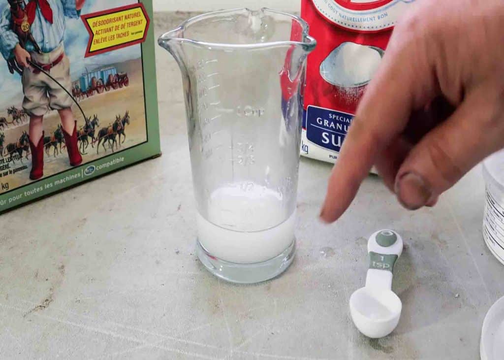 Mixing the solution for getting rid of the ants
