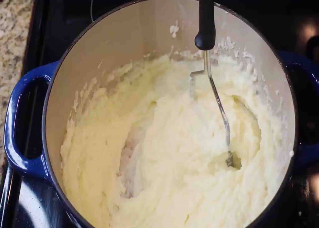 Making the mash potato for the hamburger and gravy recipe