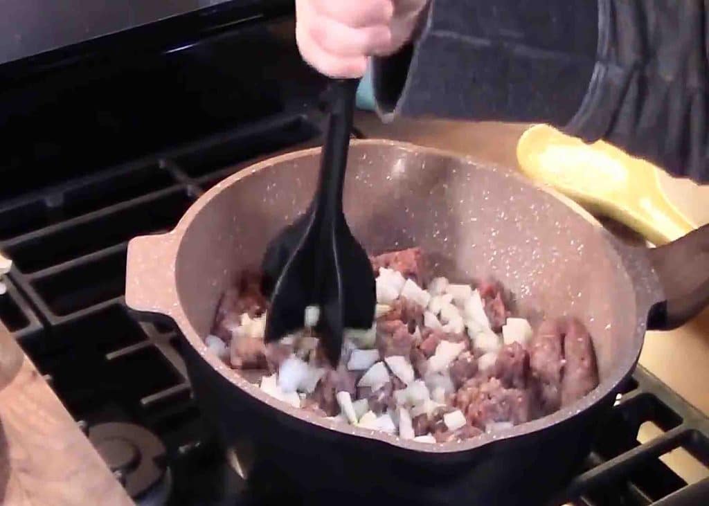 Breaking down the meat for the john wayne casserole recipe