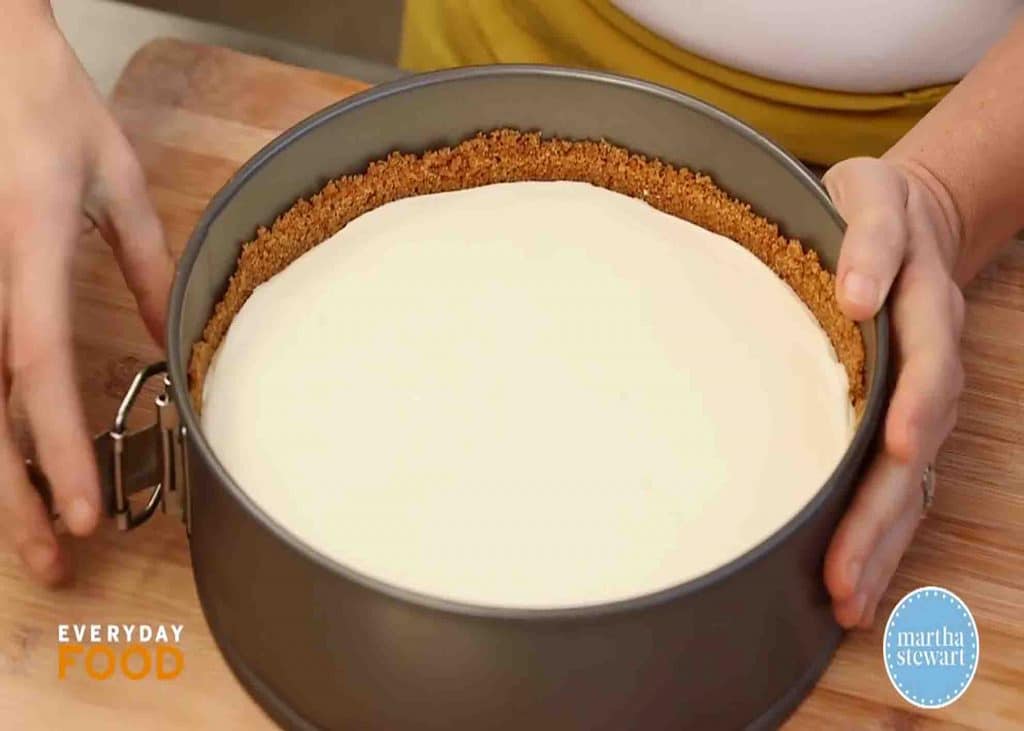 Removing the cheesecake from the pan