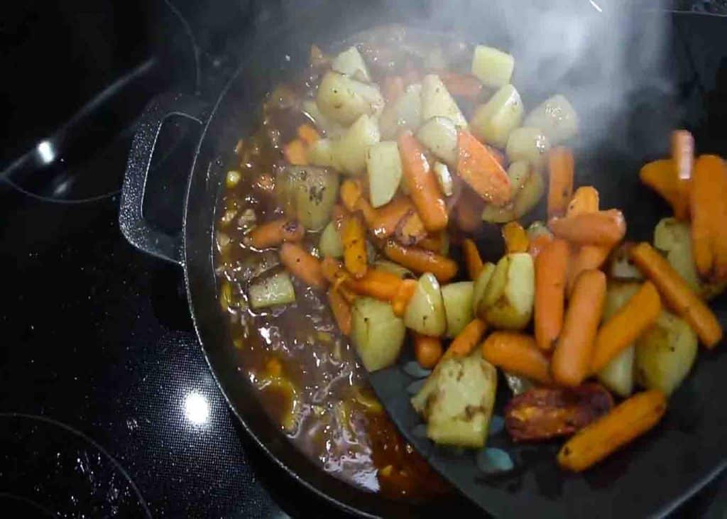 Cooking the honey chicken and veggies