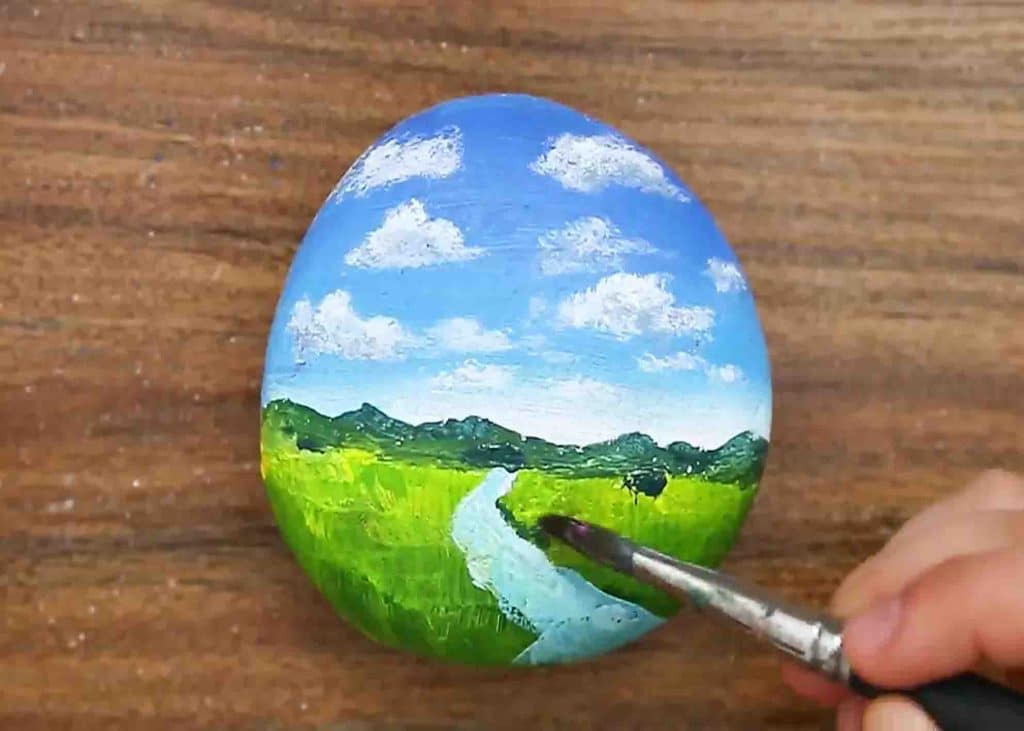 Painting the lake to the stone