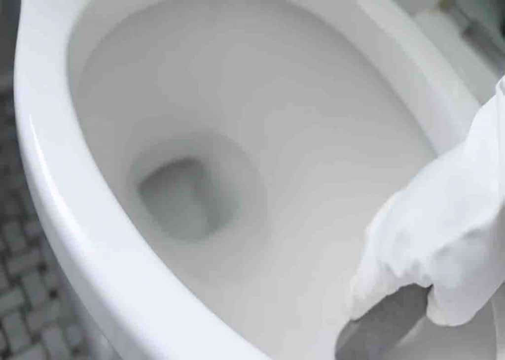 Use scouring stick to remove water rings in the toilet bowl