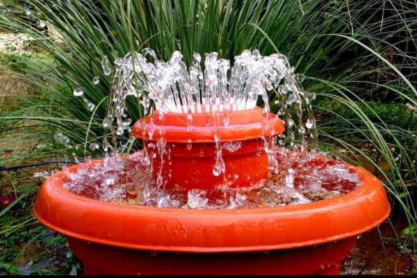 How to Make an Outdoor Fountain Using Plastic Pots