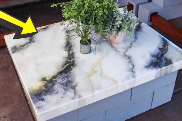DIY cinderblocks and epoxy patio table tutorial