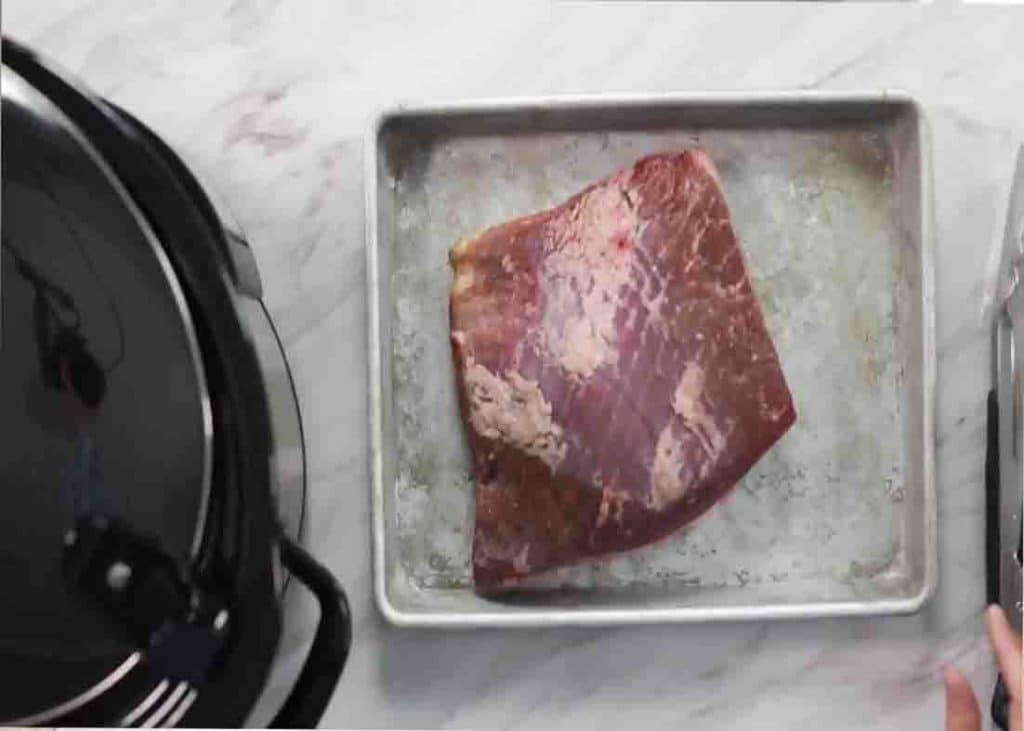 Preparing the flat-cut beef brisket