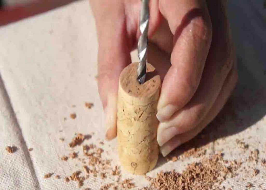 Drilling a hole to the wine cork