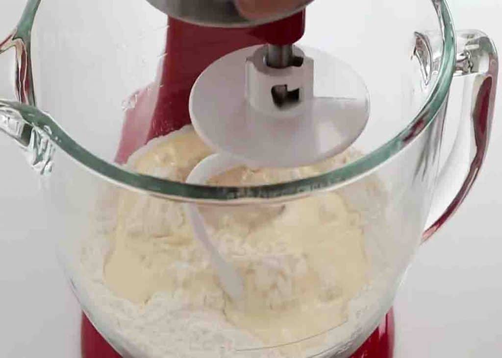 Mixing the flour to form a dough