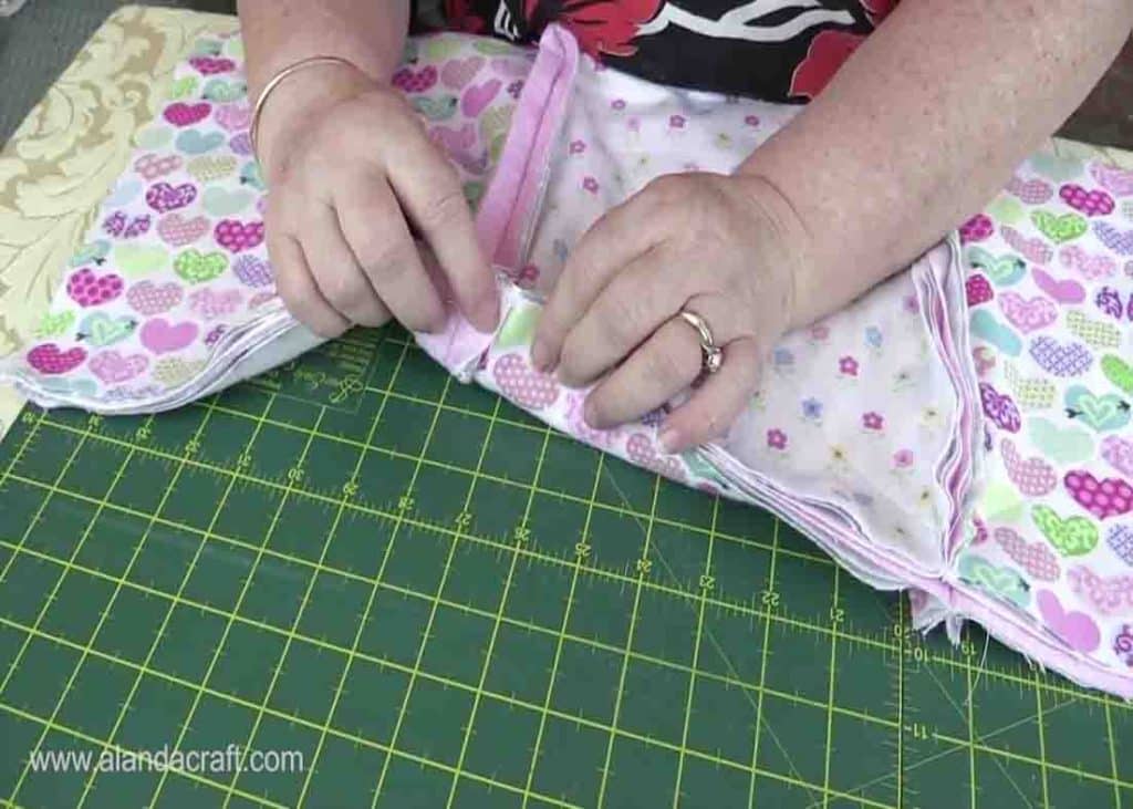 Sewing the rows of the rag quilt