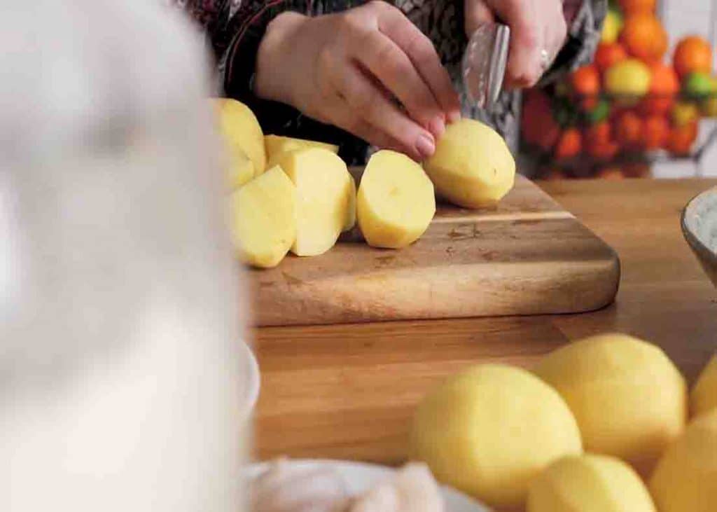 Chopping the potatoes for the mashed potato