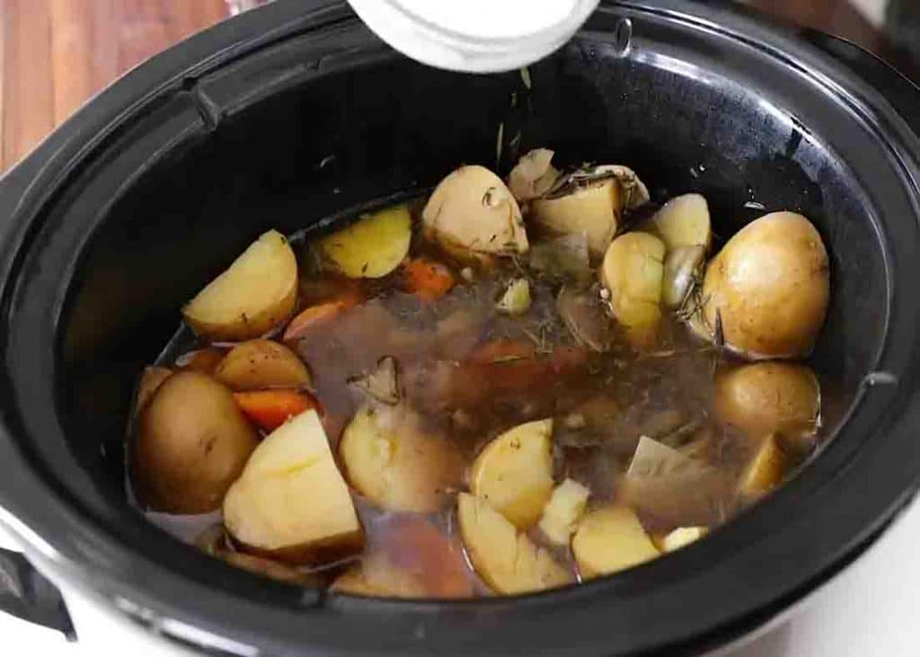 Mixing the veggies in the slow cooker