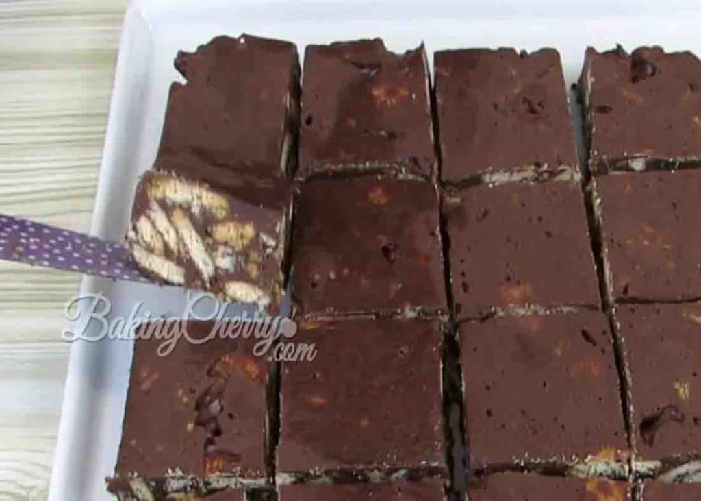 Cutting the fudge bars into bite-size pieces