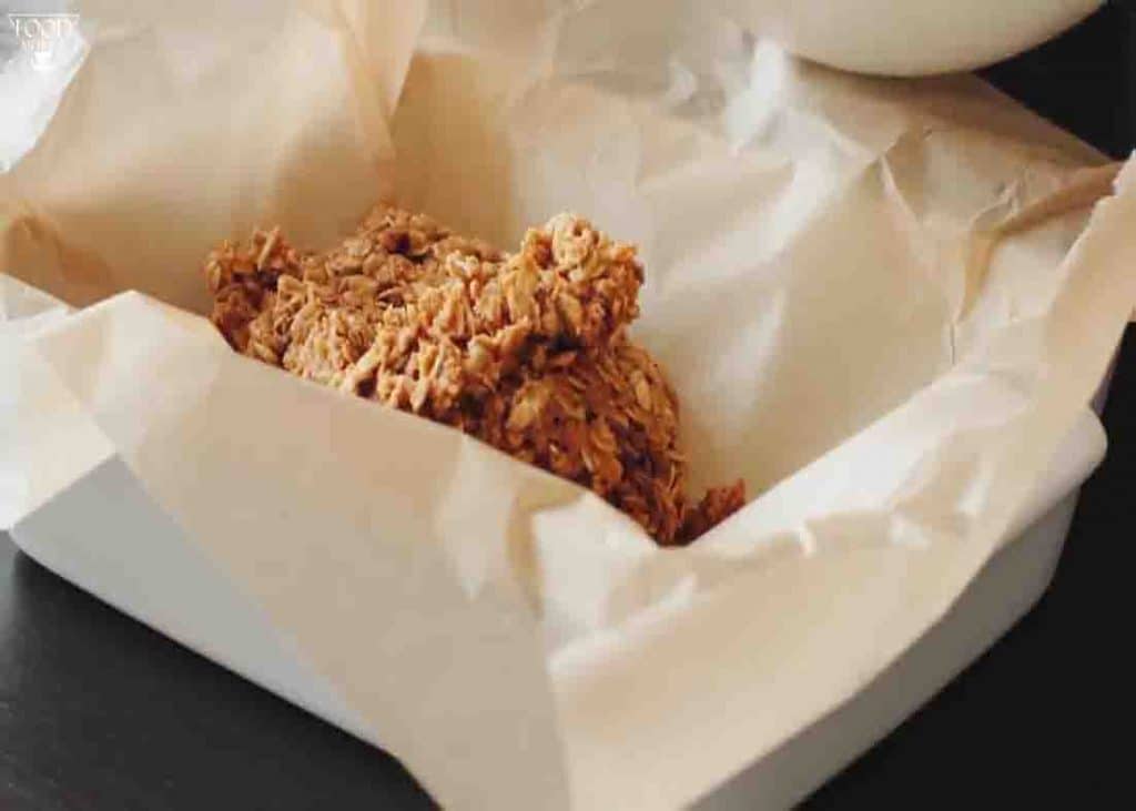 Transferring the oatmeal mixture to the baking pan