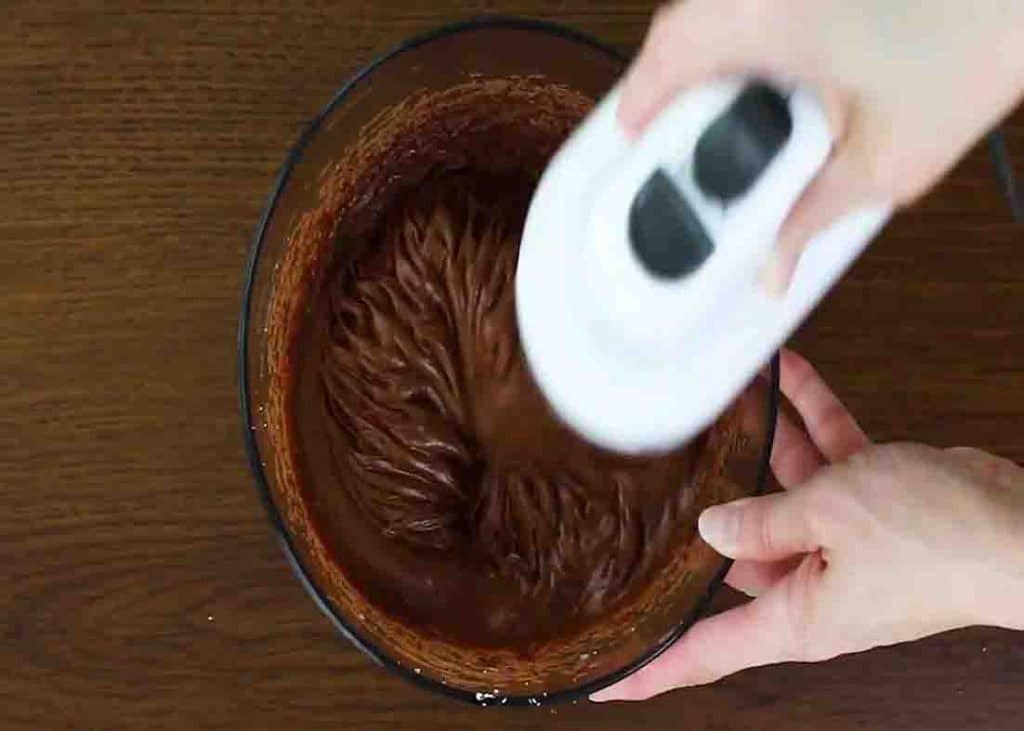 Making the frosting for the Dr. Pepper cake