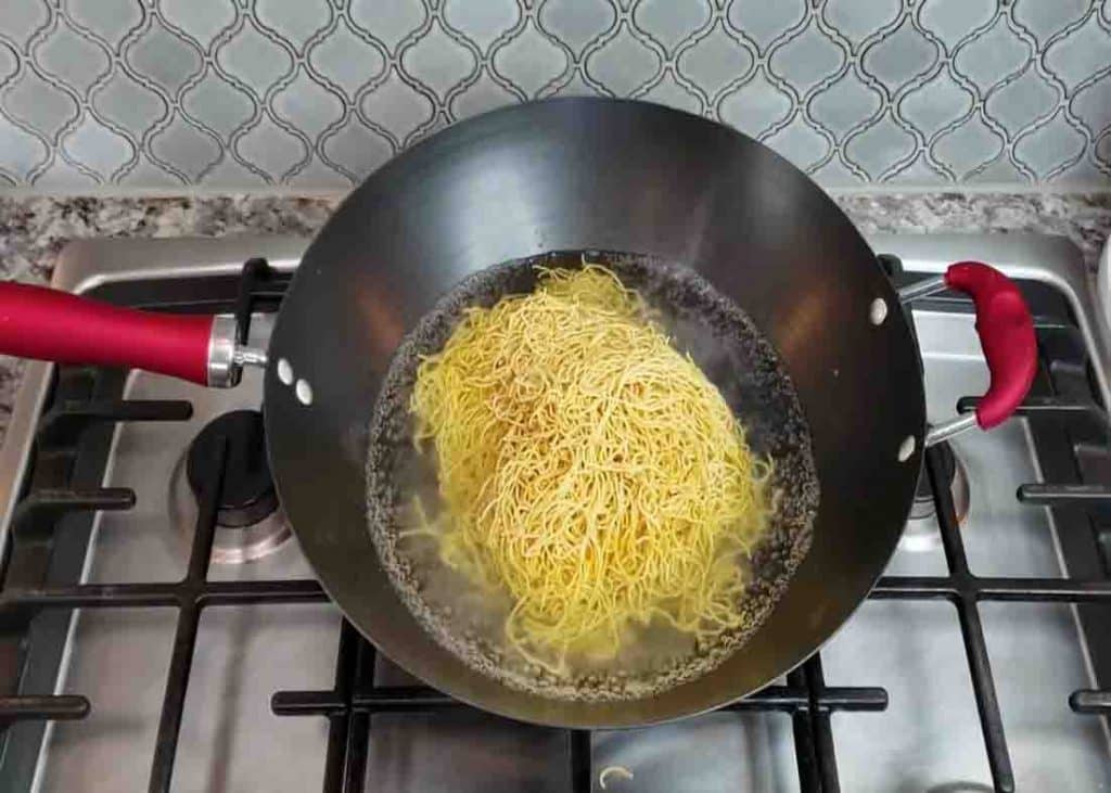 Cooking the chow mein noodles
