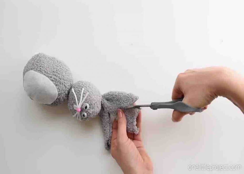 Cutting the ears of the bunny