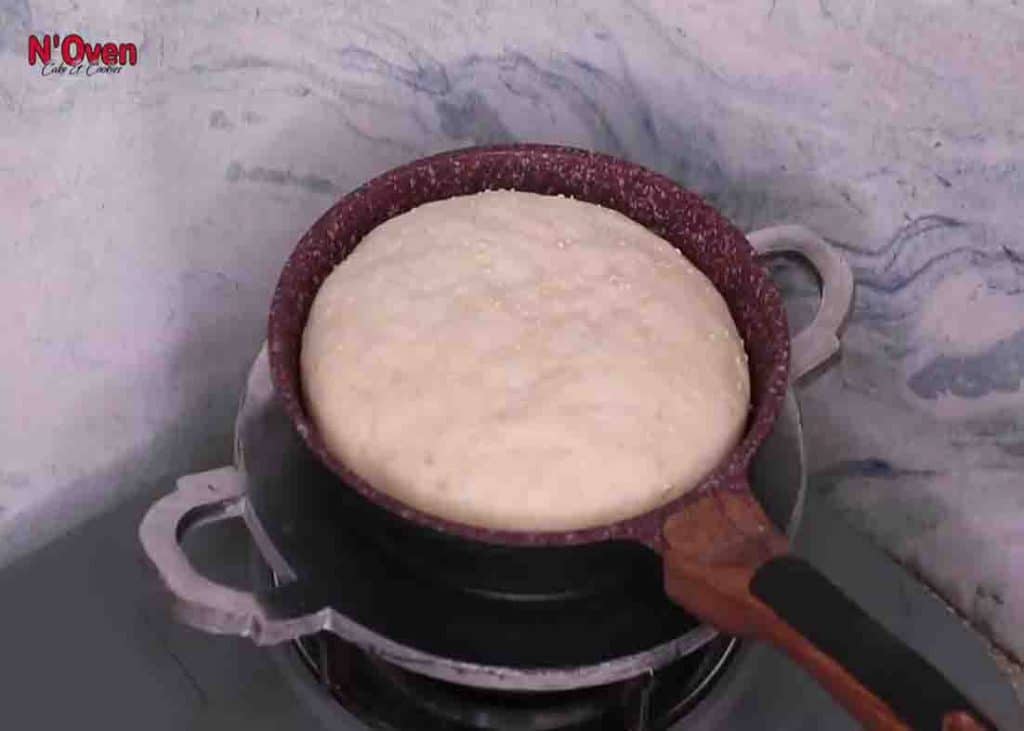 Cooking the soft bread on a stovetop